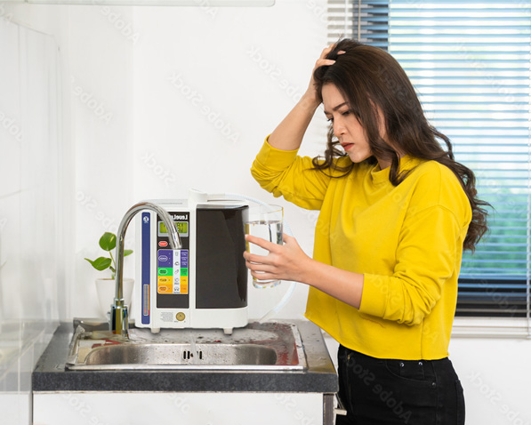 Woman with Water Ionizer